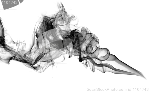 Image of Puff of black abstract smoke over white