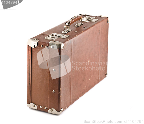 Image of Old-fashioned scratched suitcase isolated