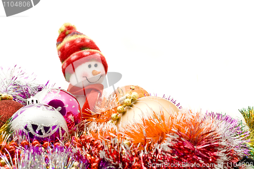 Image of Funny snowman and decoration balls 
