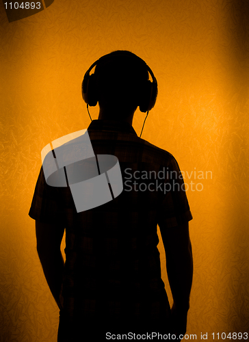 Image of Silhouette of man with headset