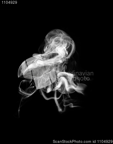 Image of Abstract white smoke shape over black