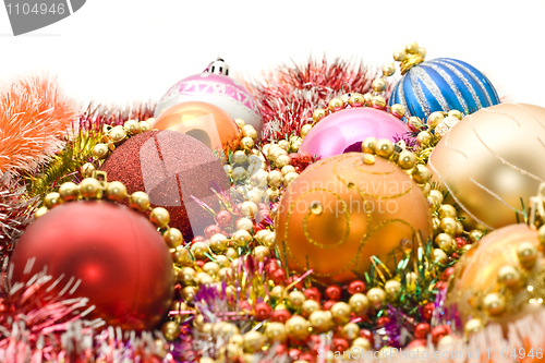 Image of Colorful Christmas decoration - baubles, tinsel, beads