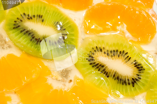 Image of Fruit background. Kiwi and mandarin