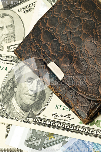 Image of Closeup of Old wallet, US dollar banknotes