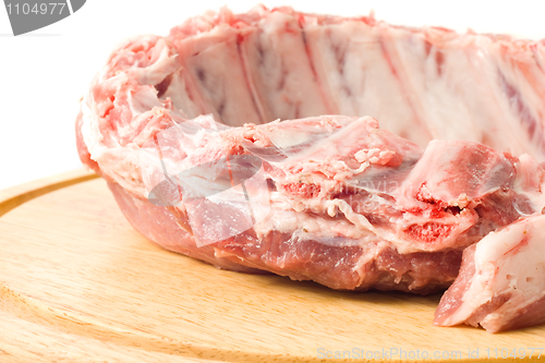 Image of Closeup of Pork ribs on hardboard