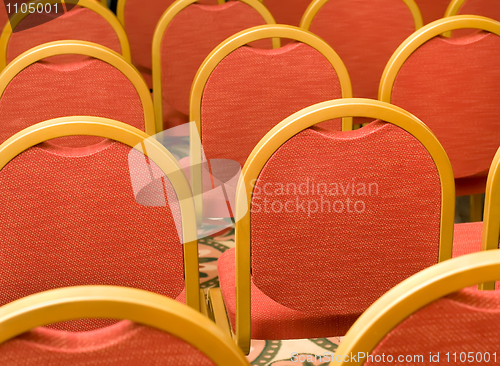 Image of Rows of red Chairs in the conference hall