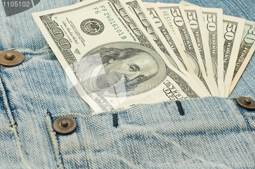 Image of Money in jeans pocket - dollars 