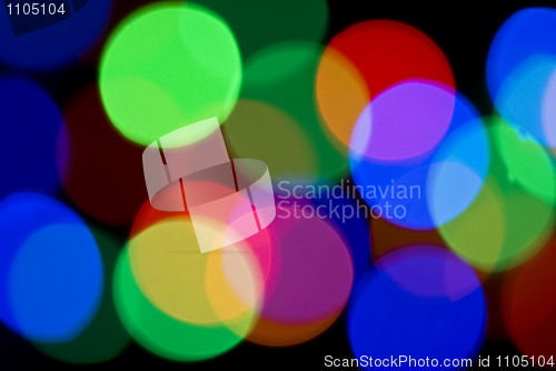 Image of Colorful Blurred festive lights at night 