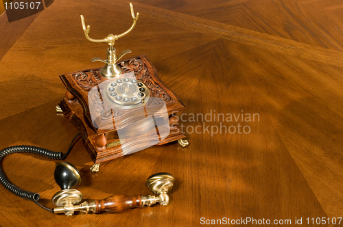 Image of Picked up phone. Old-fashioned telephone