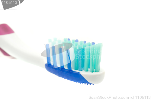 Image of Closeup of toothbrush on white