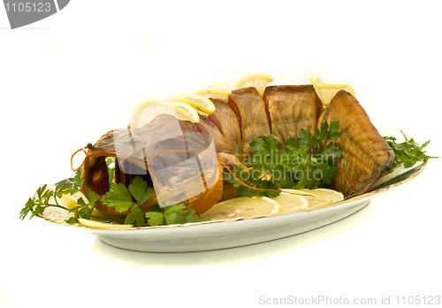 Image of Dinner - bloated fresh-water catfish on the plate