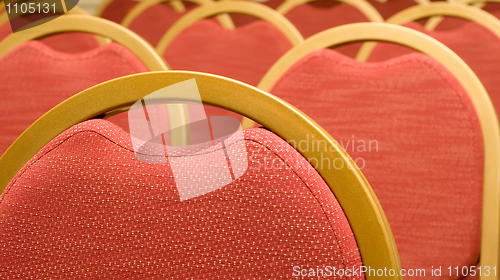 Image of Closeup of red Chair in the conference hall