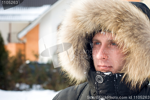 Image of Snowball fight - man in warm jacket