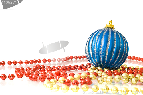 Image of Christmas decoration - colorful beads and striped blue ball 