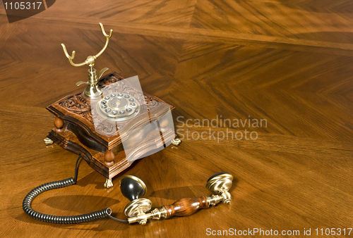 Image of Pick up the phone. Old-fashioned telephone