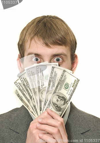 Image of Surprised or amazed Businessman with hundreds of dollars 