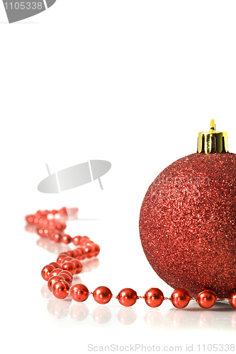 Image of Christmas is coming. Red Decoration ball and red tinsel