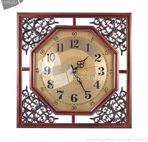 Image of Antique wall clock with carved wooden frame