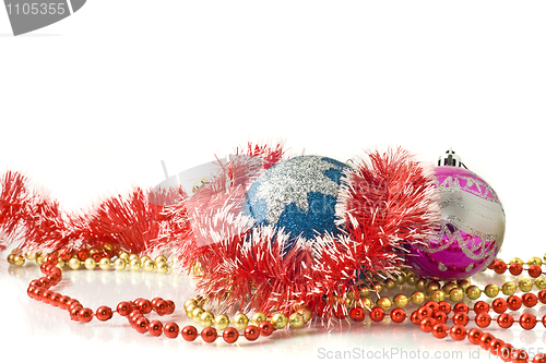 Image of Christmas greetings - decoration baubles and tinsel