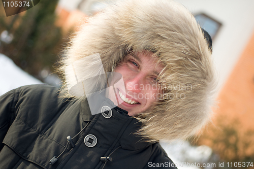 Image of Winter time - smiling man in warm jacket