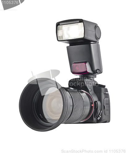Image of Professional camera with telephoto lens and flash
