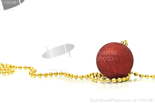 Image of Christmas. Colorful red ball and golden beads