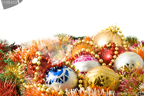 Image of Beautiful Christmas decoration balls and colorful tinsel 