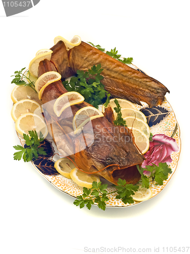 Image of Catfish or sheatfish with lemon and parsley 