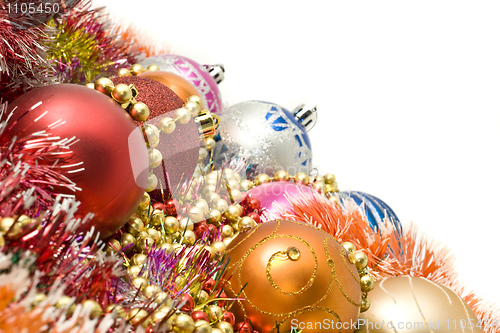 Image of Christmas greetings - colorful decoration balls and beads