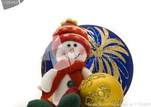 Image of Cute Cuddly Christmas toy with colorful New Year Balls