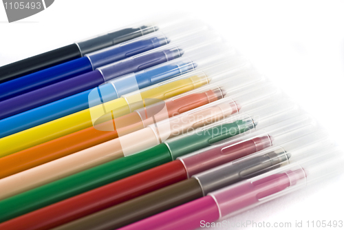 Image of Colorful felt-tip pens (markers) over white