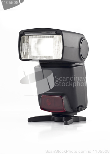 Image of Professional Flash on stand for digital camera isolated