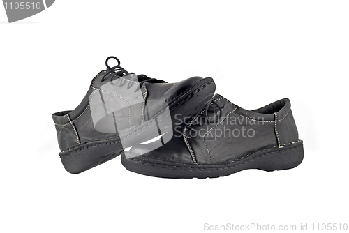 Image of Black women's leather shoes over white