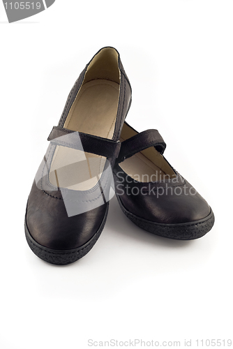 Image of Modern women's leather shoes over white