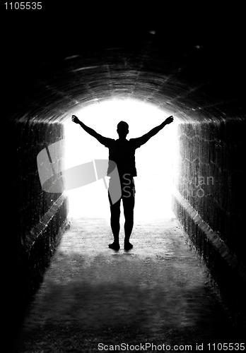 Image of Human silhouette in tunnel exit