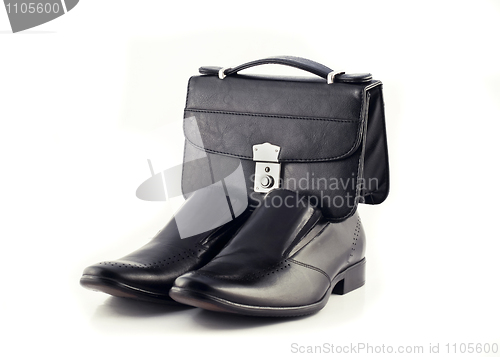 Image of Pochette and Pair of men's classic leather shoes isolated