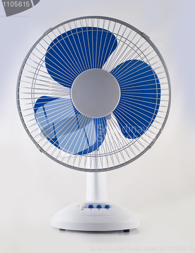 Image of Modern desk cooling fan over white and grey