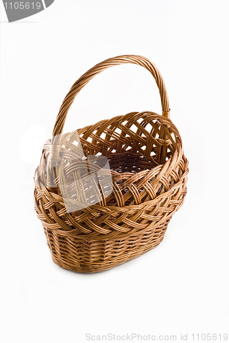 Image of Beautiful Wicker woven basket over white 