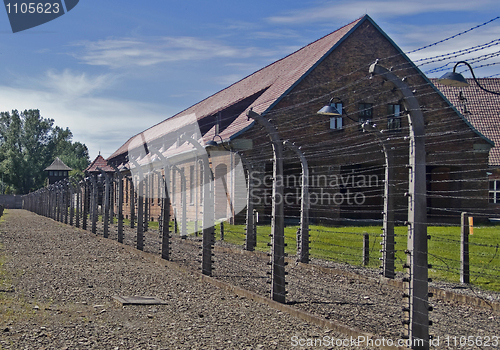 Image of Wire fence and barrack in A uschwitz - Birkenau concentration ca