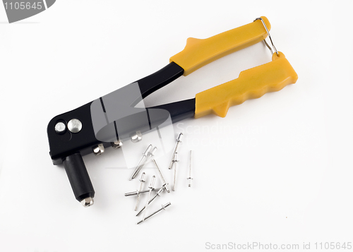 Image of Rivet pistol and clinchers isolated over white