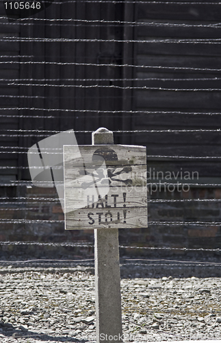 Image of Caution sign board in Auschwitz concentration camp