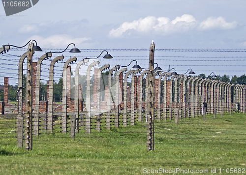 Image of Wire fence and stoves in Birkenau concentration camp