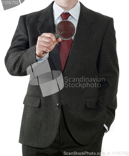 Image of Businessman with magnifier