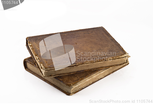 Image of Stack of Old frayed books isolated over white