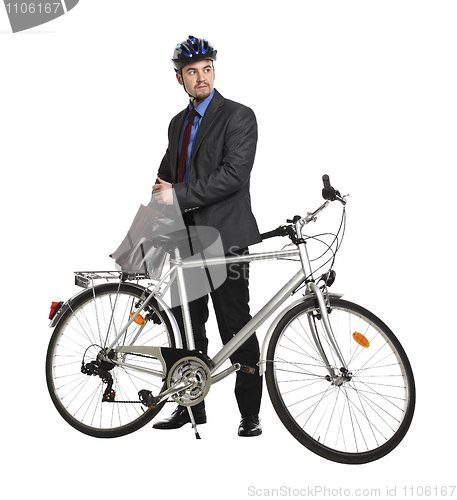 Image of business man and cùbicycle