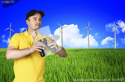 Image of man and wind turbine  landscape