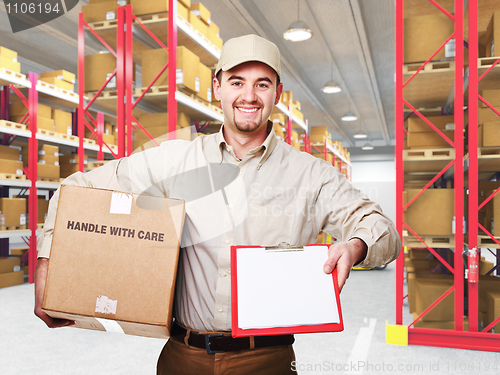 Image of delivery man in warehouse