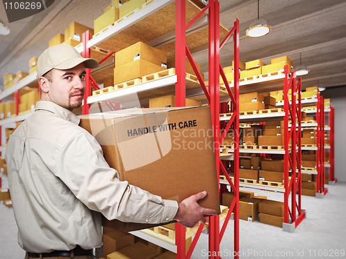 Image of delivery man in warehouse