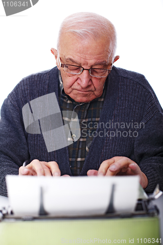 Image of old man and typewriter