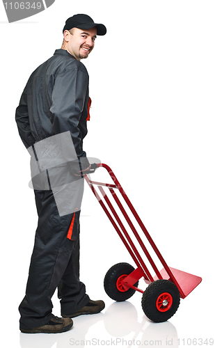 Image of worker with handtruck